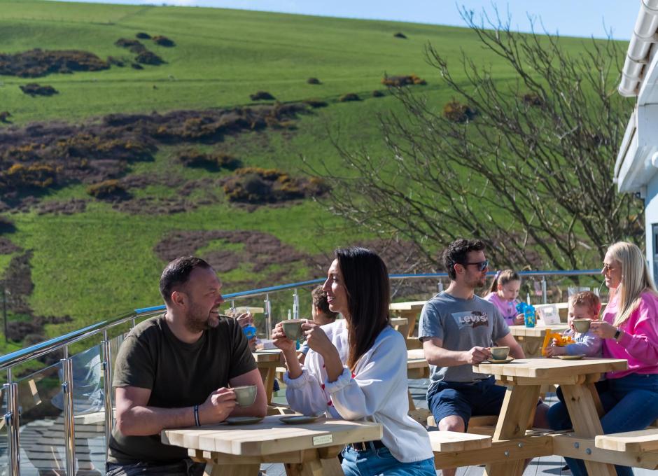 Woolacombe Sands Holiday Park Guests on the Clubhouse Terrace