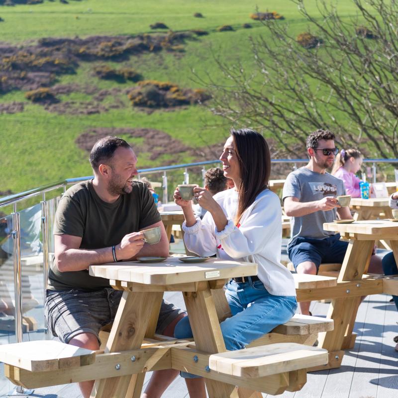 Woolacombe Sands Holiday Park Guests on the Clubhouse Terrace