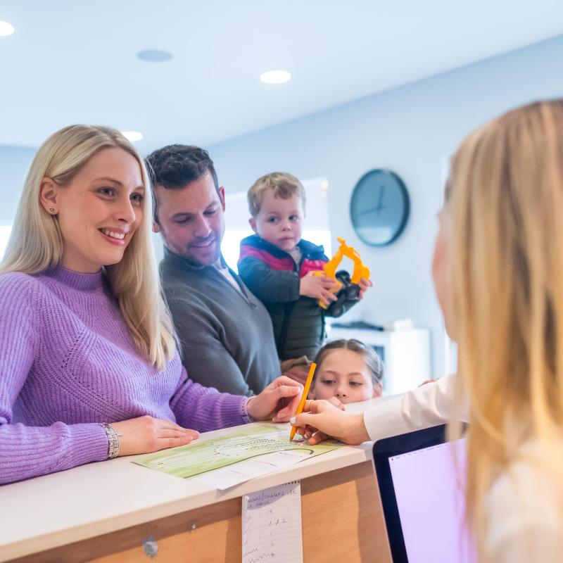 Woolacombe Sands Holiday Park Family Checking In at Reception