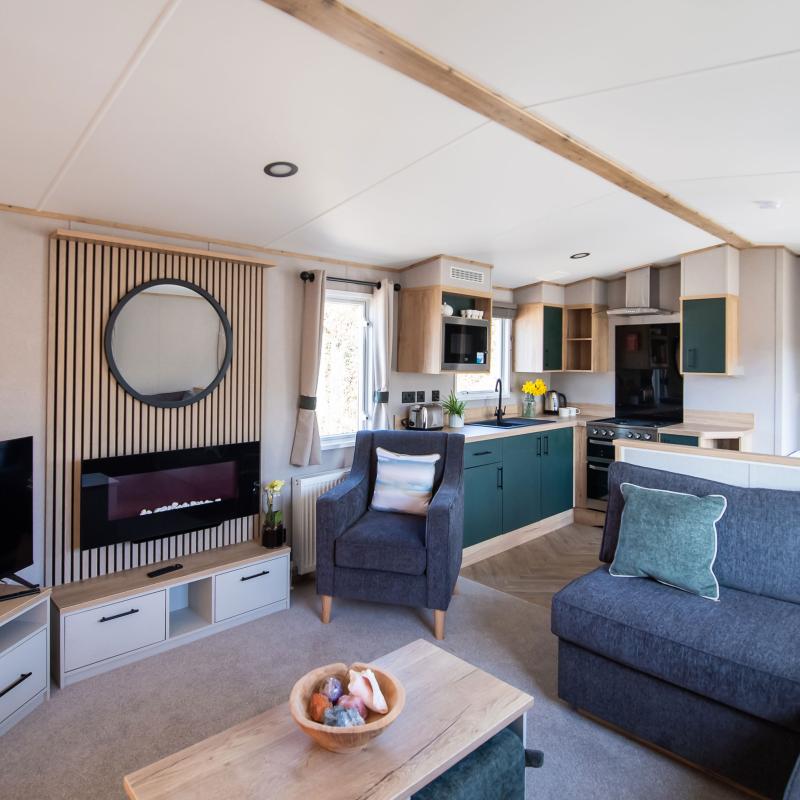 An internal view of one of the Diamond caravans at Woolacombe Sands Holiday Park showing the living area