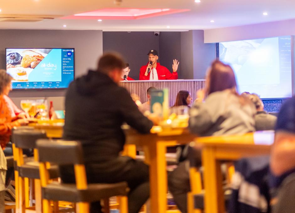 Guests enjoying Clubhouse entertainment at Woolacombe Sands Holiday Park