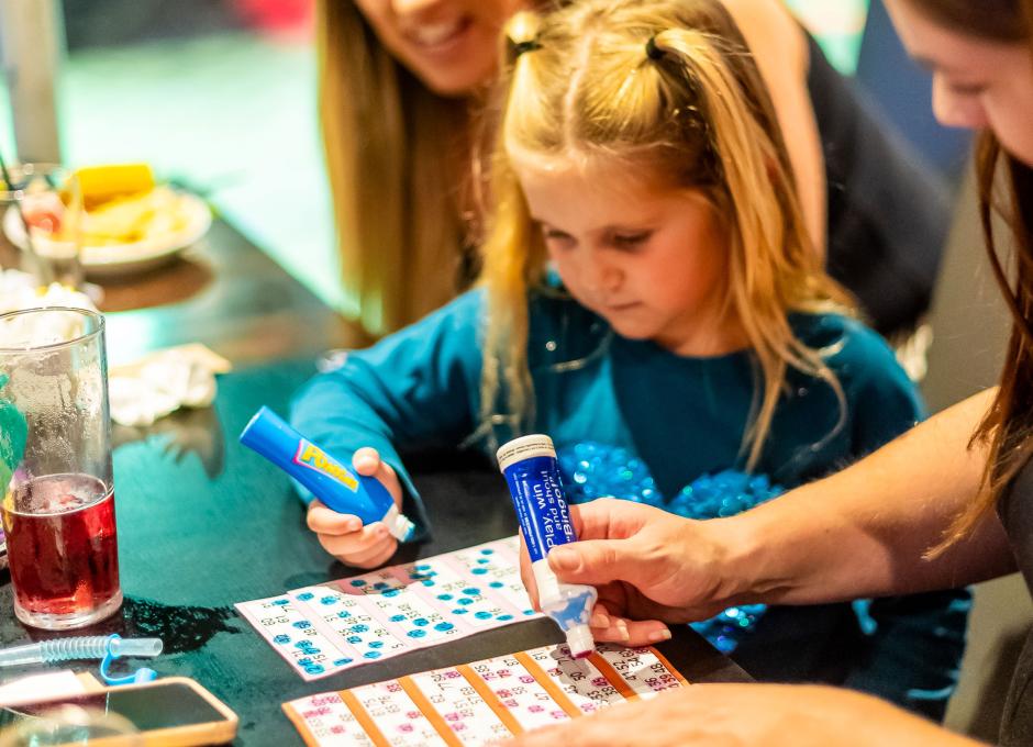 Guest playing bingo in Woolacombe Sands Clubhouse